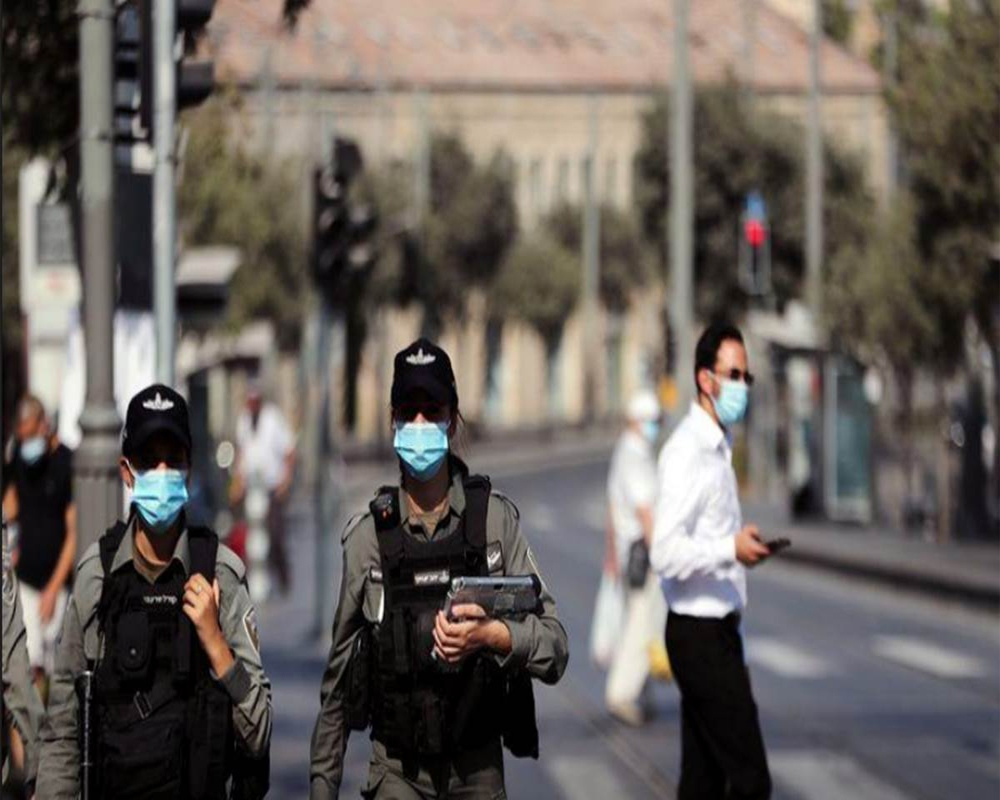 Israel tightens second lockdown as virus cases soar