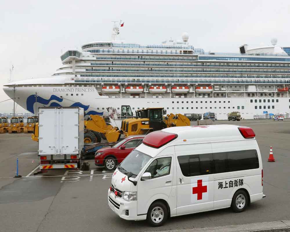 Japan lets some passengers leave ship for quarantine on land