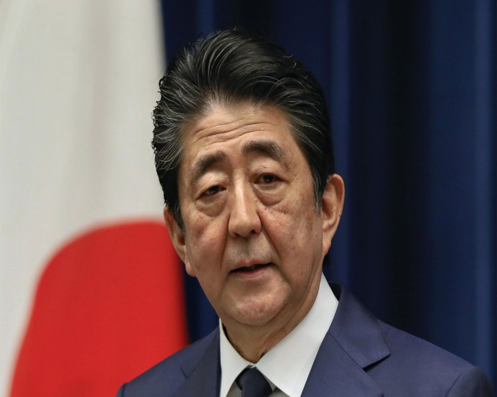 Japan PM Abe says country at critical stage
