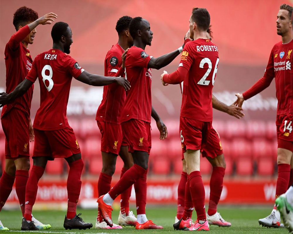 Liverpool makes triumphant Anfield return as English champ