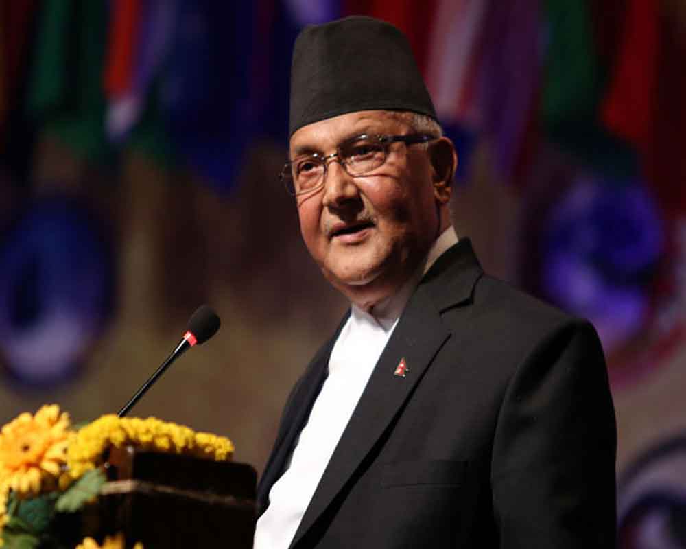 Nepal will get back land from India through dialogue: PM Oli