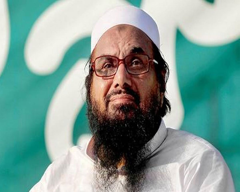 Pak court jails 2 more aides of JuD chief Hafiz Saeed in terror financing case
