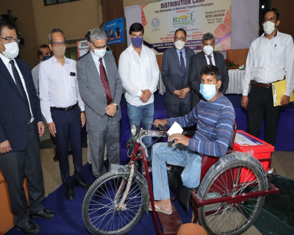 REMCL distributes tricycles to divyangs