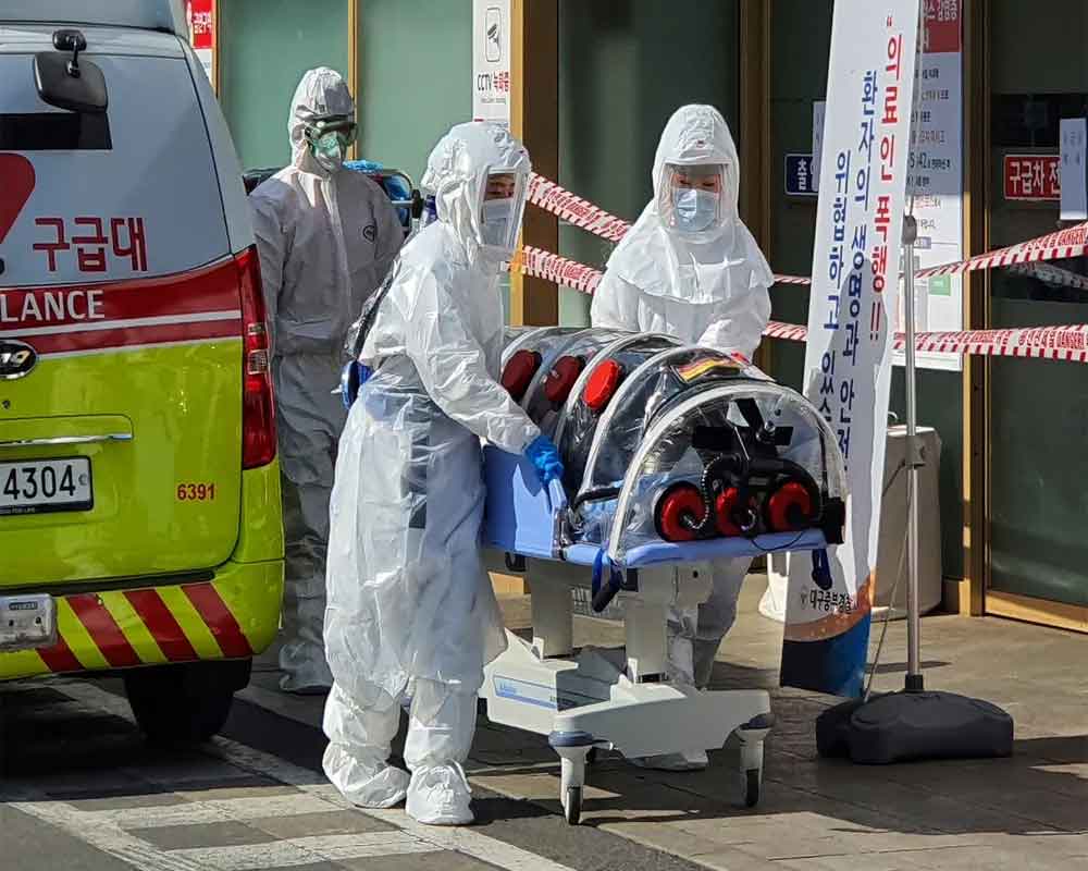 South Korea virus cases spike, as Italy and Iran take drastic steps