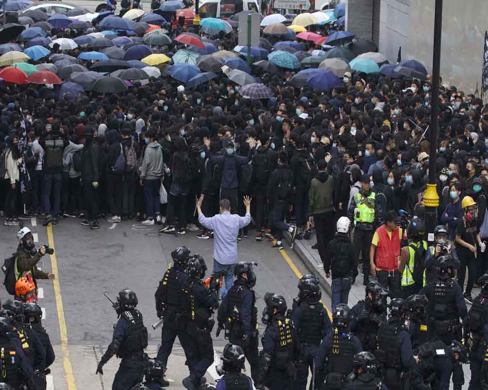Thousands-strong Hong Kong protest cut short by clashes