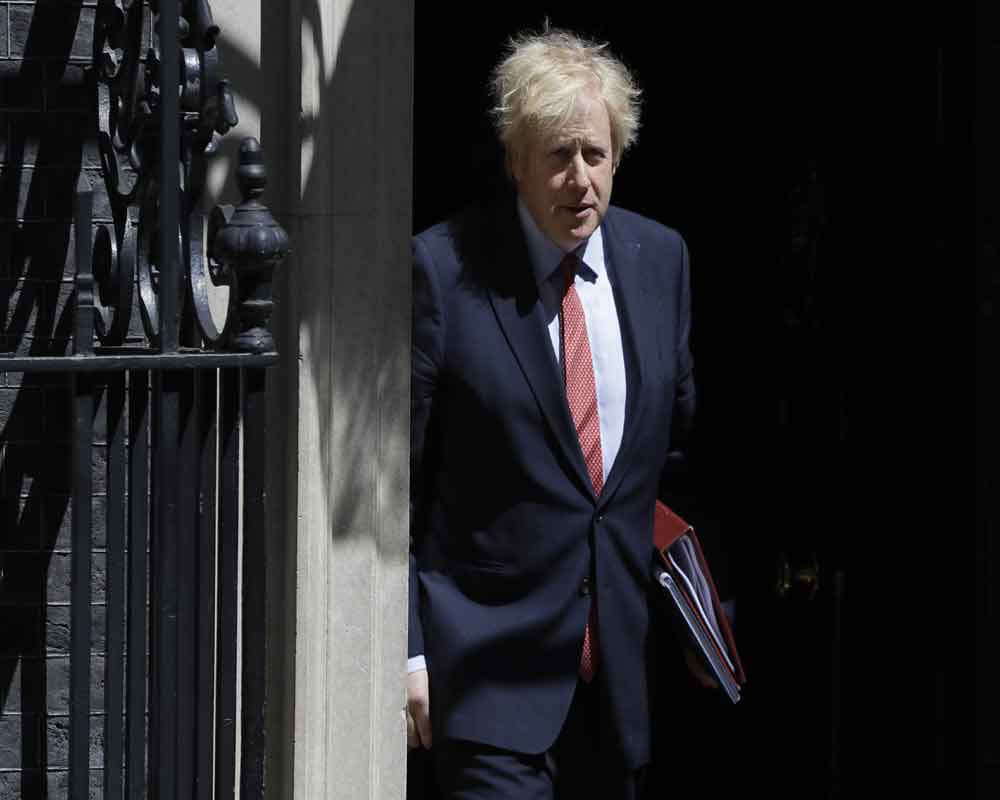 UK watchdog clears Johnson of criminal wrongdoing