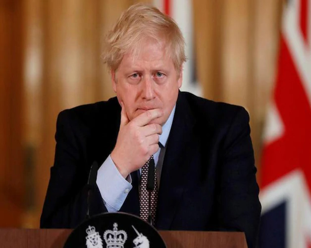 Boris Johnson promises permanent memorial to lives lost to Covid