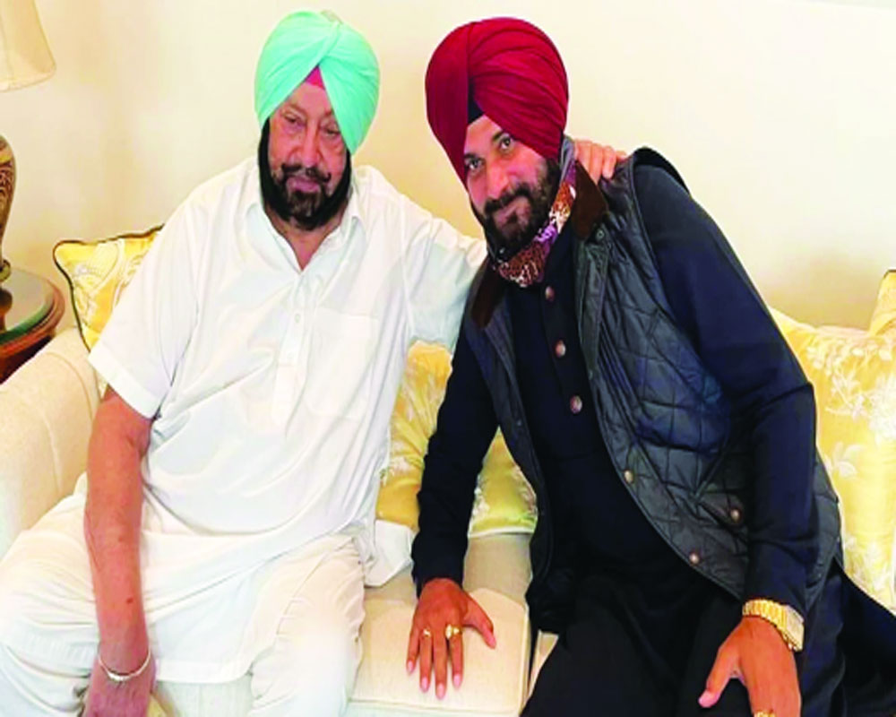 Capt relents, Sidhu set to be State Cong chief