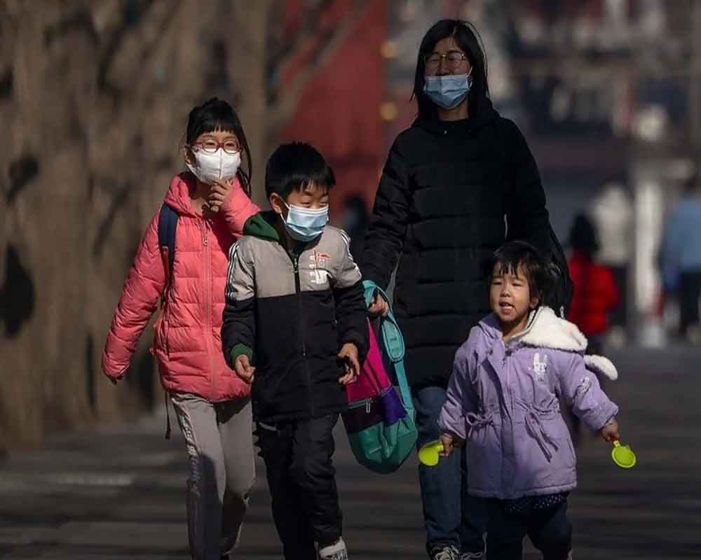 China approves three-child policy with sops to encourage couples to have more children