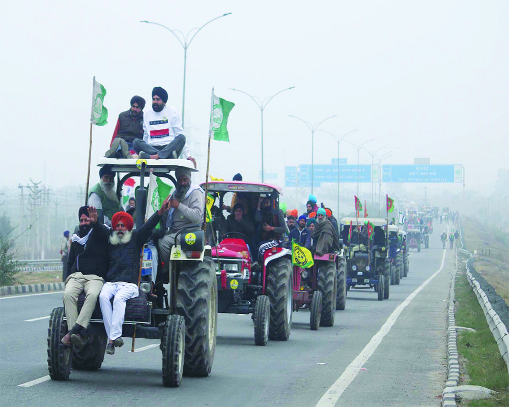 Farmers display determination in tractor rallies