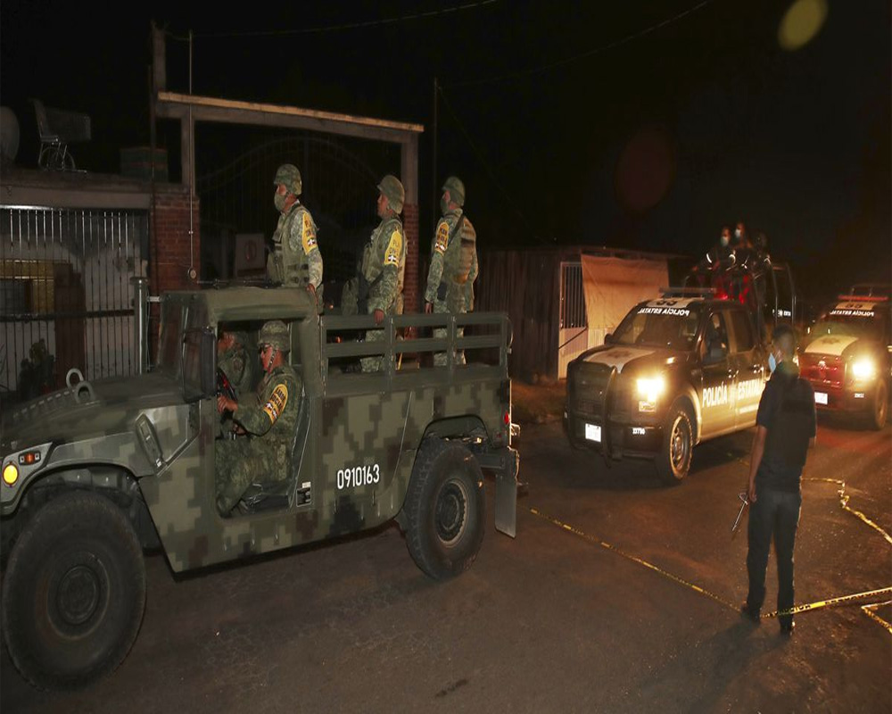 Gunmen ambush police convoy near Mexico City, killing 13