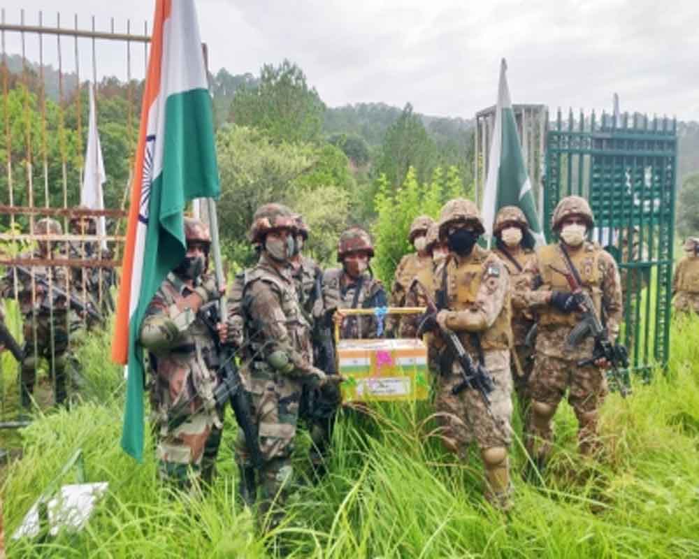 India, Pakistan armies share sweets at Line of Control on Eid