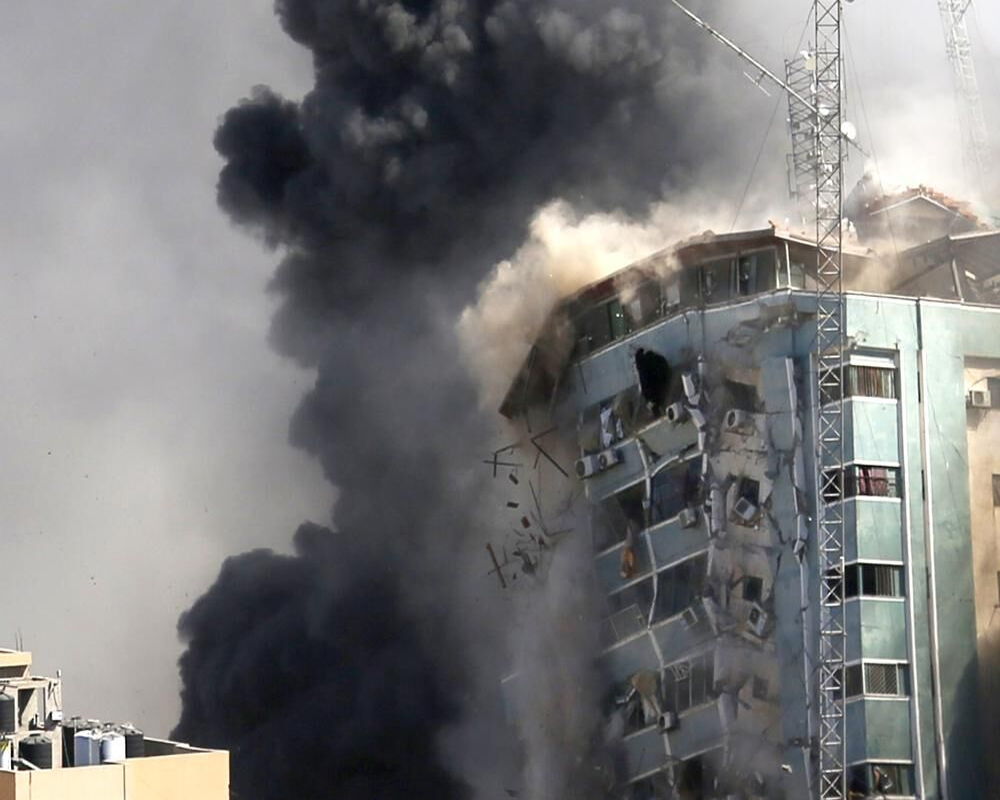 Israeli airstrikes hit buildings, roads in Gaza