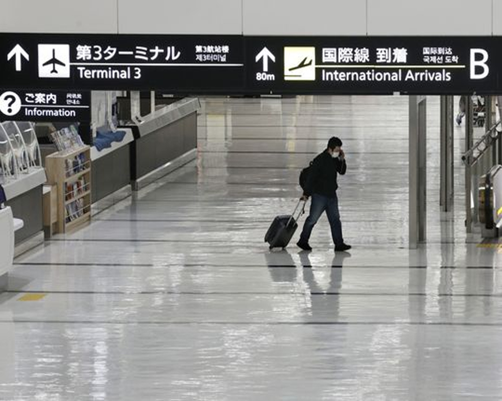 Japan retracts new flight bookings ban after criticisms