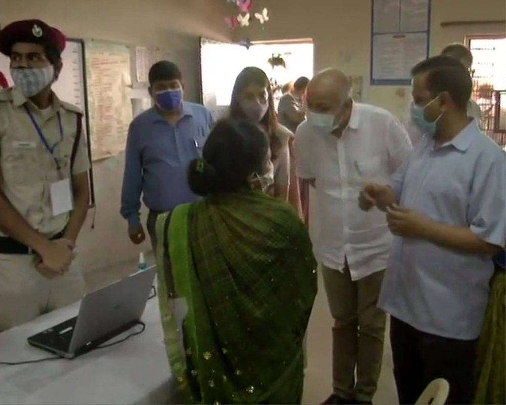 Kejriwal visits vaccination centre, says people happy over getting jabs at polling booths