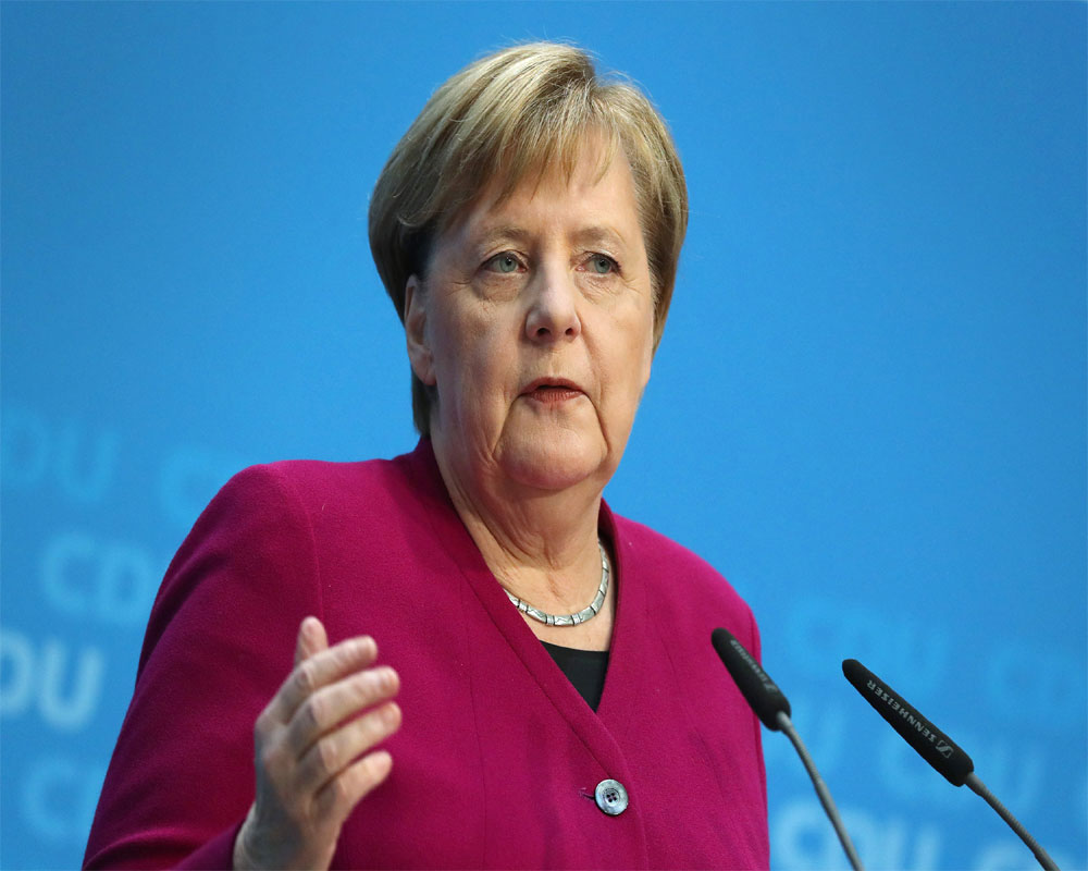 Merkel calls for ramping up global vax production