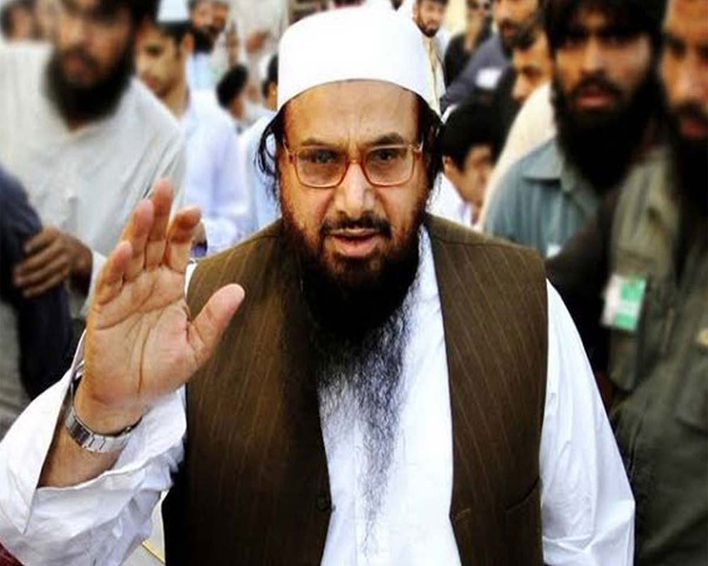 Pak anti-terrorism court jails Hafiz Saeed's 3 aides in terror financing  case