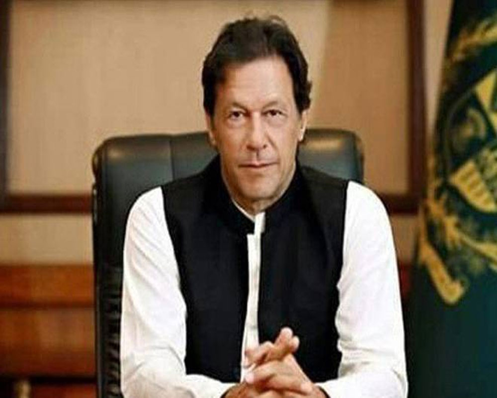Pak PM Imran Khan faces flak for holding in-person meeting despite being infected with coronavirus