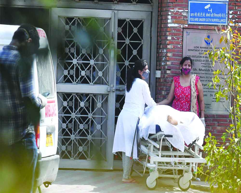 Patients die on pavements outside cramped hospitals