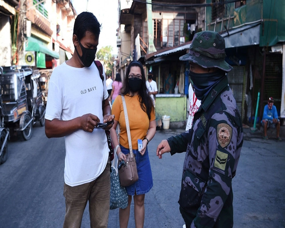 Philippines extends lockdown as infections spike