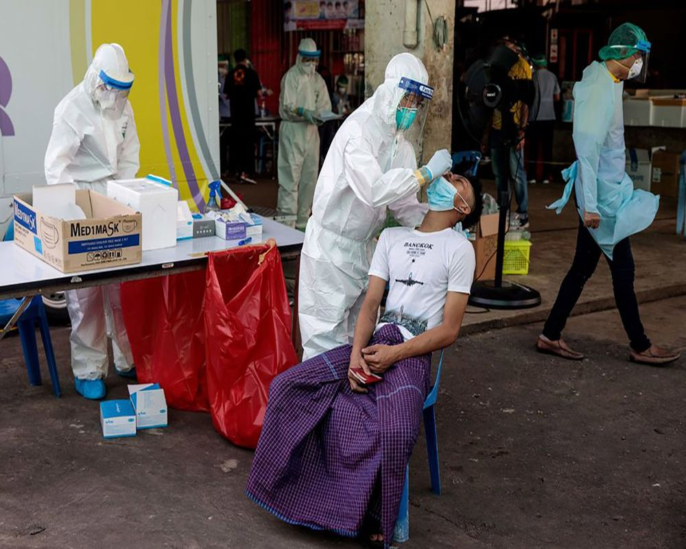 Thailand's daily COVID infections hit record, topping 1,300