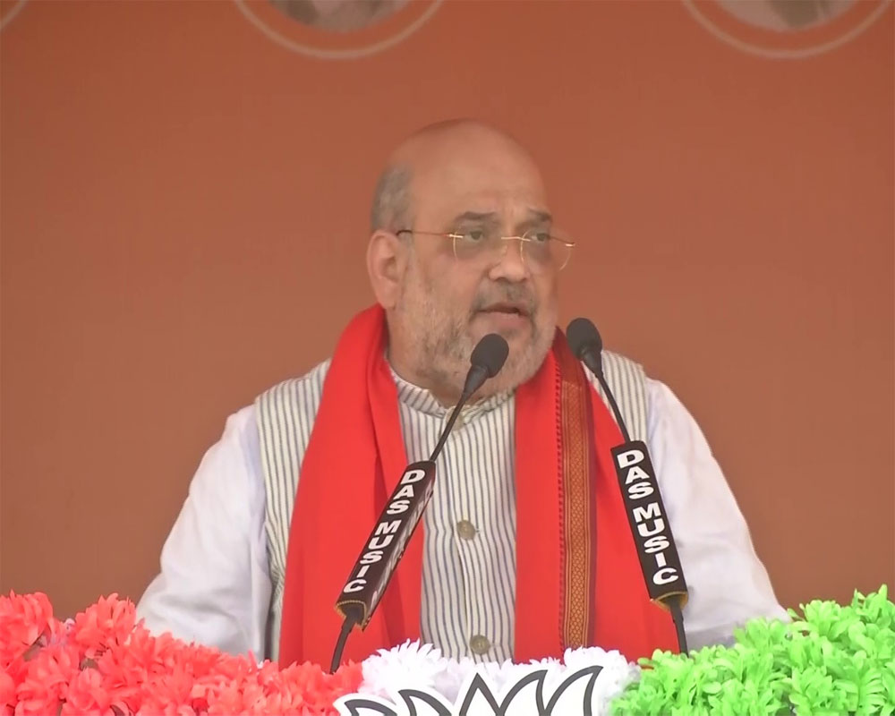 Vote for Modi if you want schemes,for TMC if you prefer scams: Amit Shah
