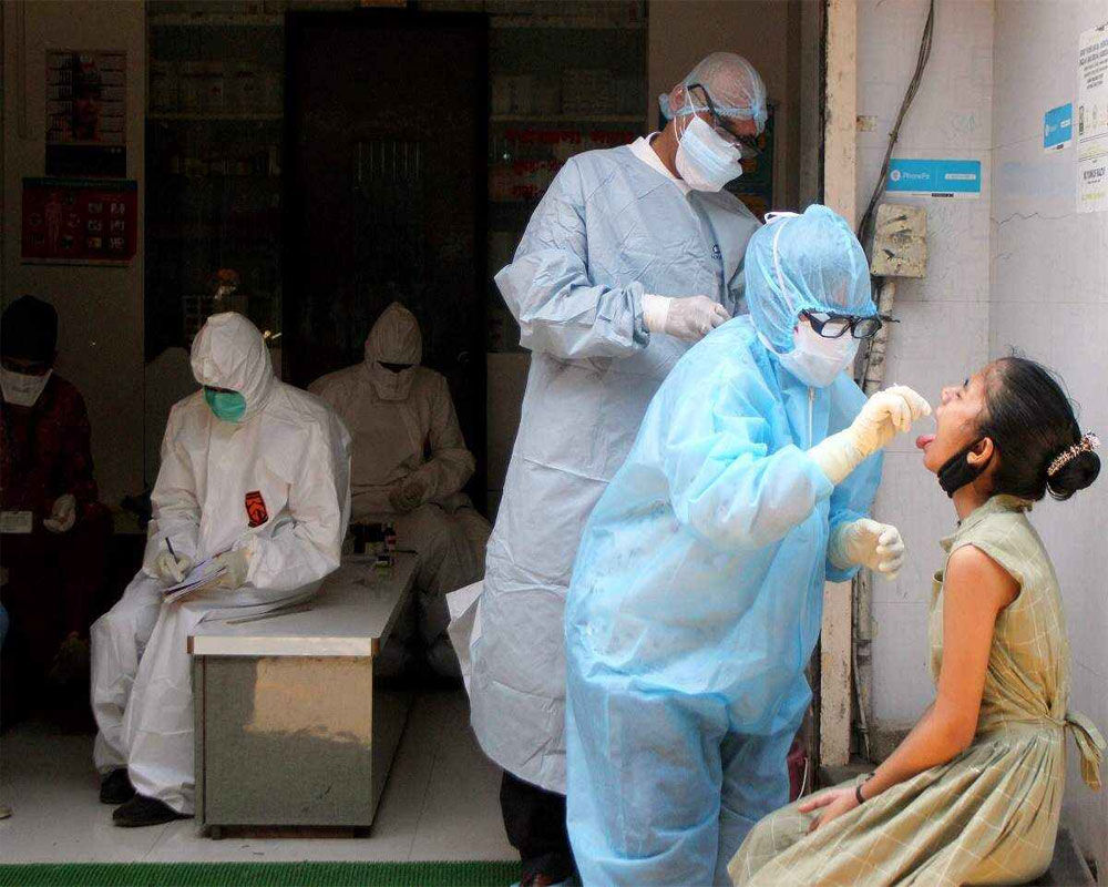 India records 2,58,089 new coronavirus cases, 385 deaths; positivity rate 19.65 per cent