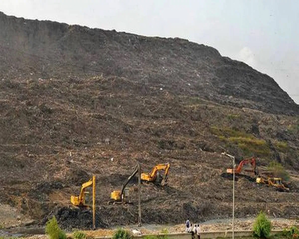 Living in shadow of Delhi's tallest garbage mountain, Ghazipur locals  continue to gasp for fresh air
