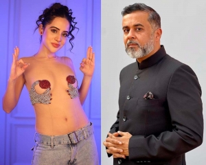Uorfi calls Chetan Bhagat a 'pervert' after he questions her dress sense