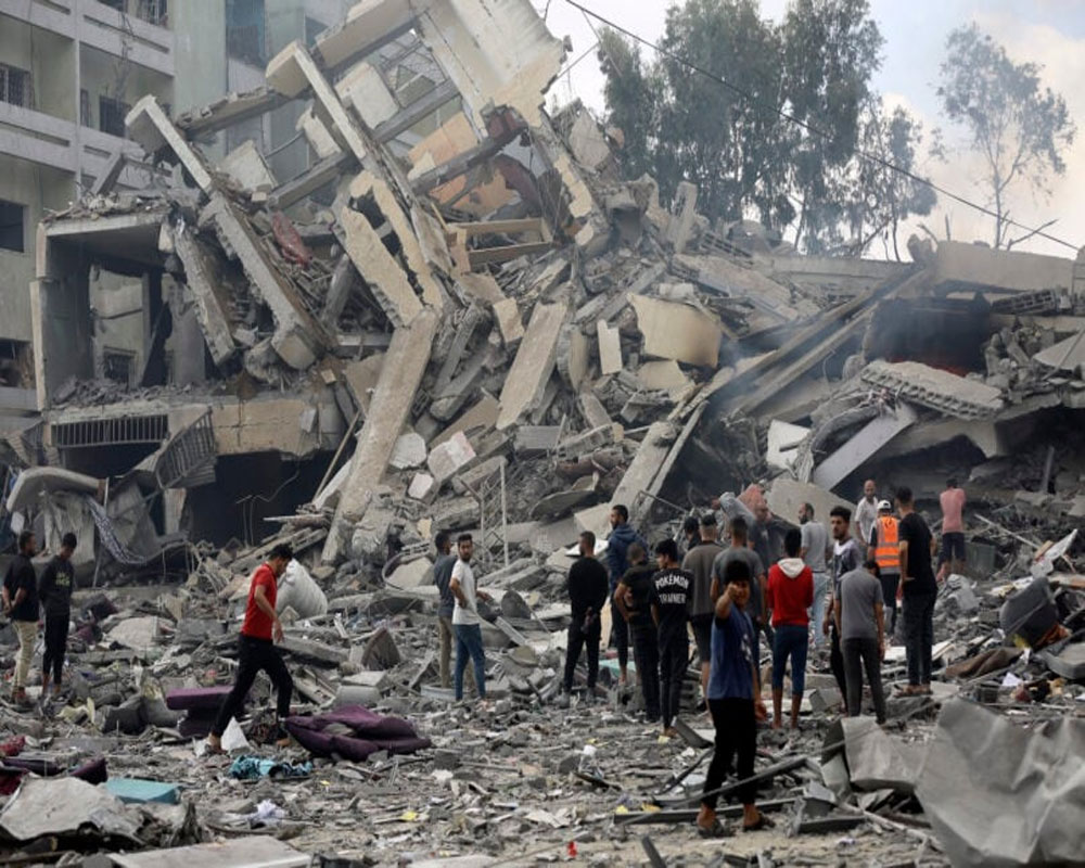 As Israel readies troops for ground assault, Gaza awaits urgently needed aid from Egypt
