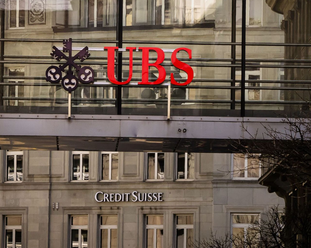 Credit Suisse, UBS shares plunge after takeover announcement