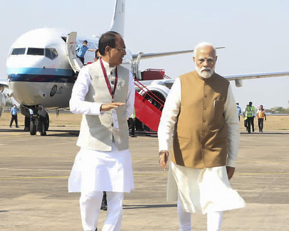PM Modi arrives in Bhopal to attend Combined Commanders' Conference and flag off Vande Bharat train