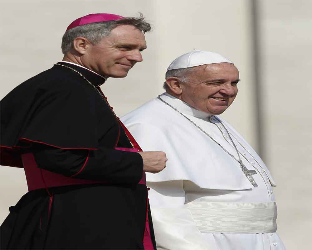 Pope meets with Benedict's aide amid funeral, book fallout