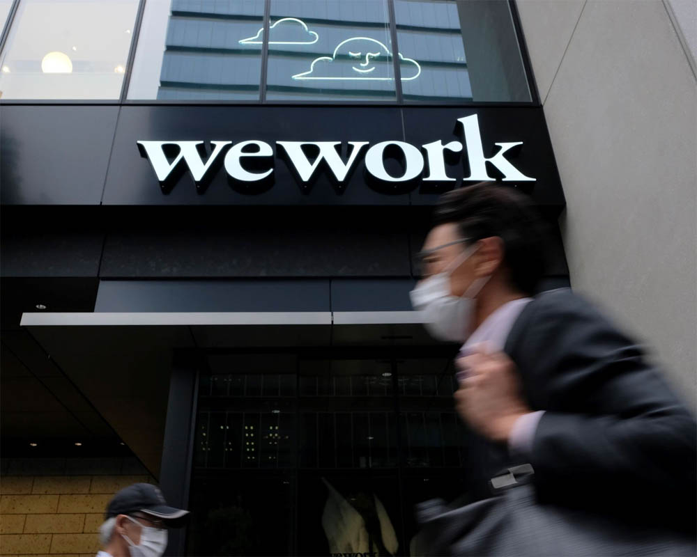 WeWork seeks bankruptcy protection, a stunning fall for a firm once valued at close to USD 50 billion