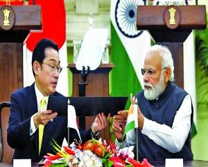 Kishida in India, Xi in Russia
