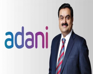 Most Adani group cos rise in morning trade