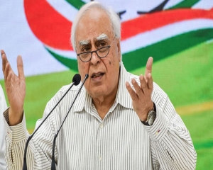 My new India will not be saffron, fractious, intolerant: Sibal's swipe at PM remarks at Parl inauguration