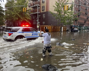 New York City area gets one of its wettest days in decades, as rain swamps subways and streets