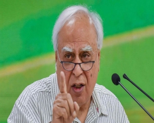 SPolitics divided, 'acchhe din' subsided: Sibal's dig over 9 years of NDA govt