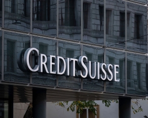 UBS to buy Credit Suisse for nearly USD 3.25B to calm turmoil