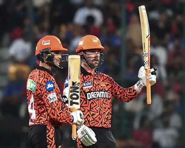 Head hundred, bowlers' resolve power SRH to 25-run win over RCB