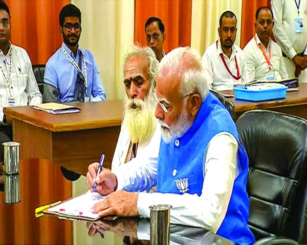 Modi files papers for new beginning