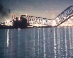 Cargo ship hits Baltimore's Key Bridge, causing it to collapse. Rescuers search for 7 in water