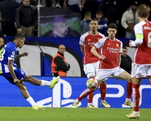 Porto beats Arsenal 1-0 with stoppage-time goal by Galeno in CL round of 16