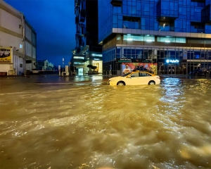 Storm dumps a year and a half's worth of water on parts of UAE, flooding roads and Dubai's airport