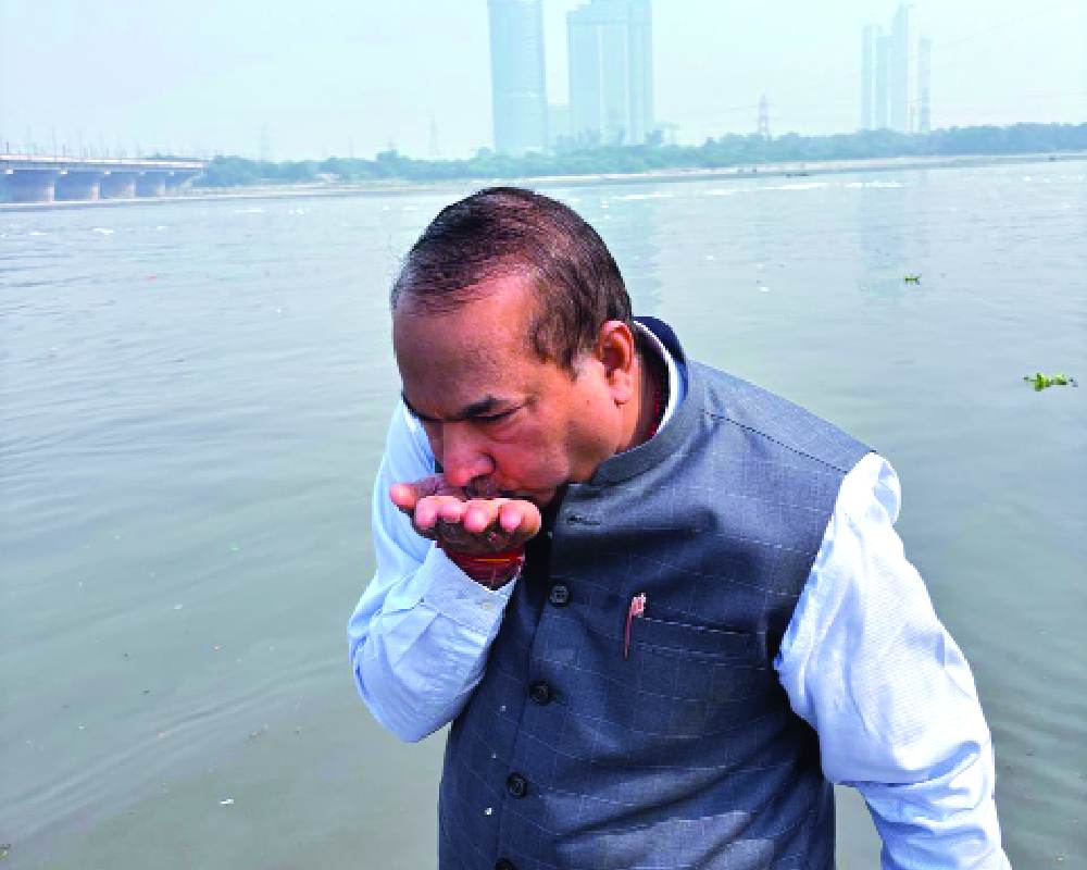 Delhi BJP leader performs aachman of Yamuna water