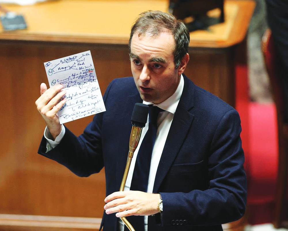 Embattled French PM survives no-confidence vote in Parliament