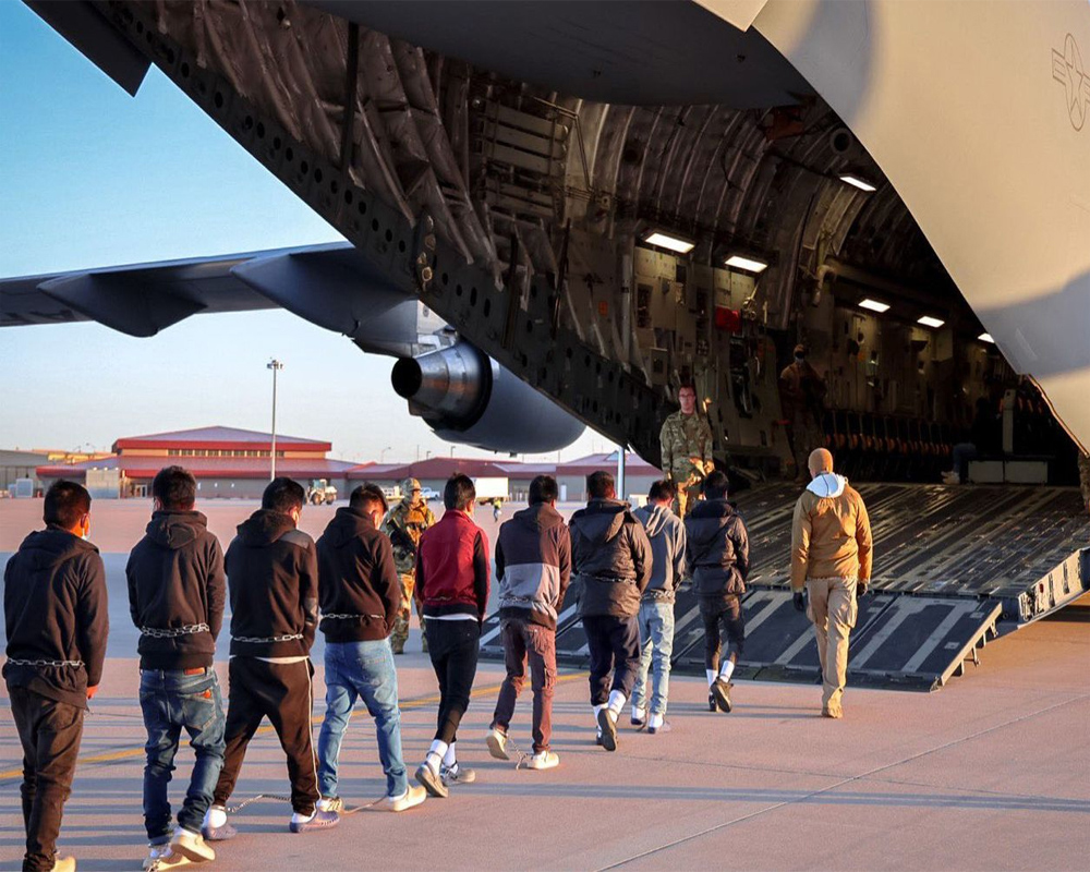 First military flight lands in Guantanamo Bay with migrants deported from the US