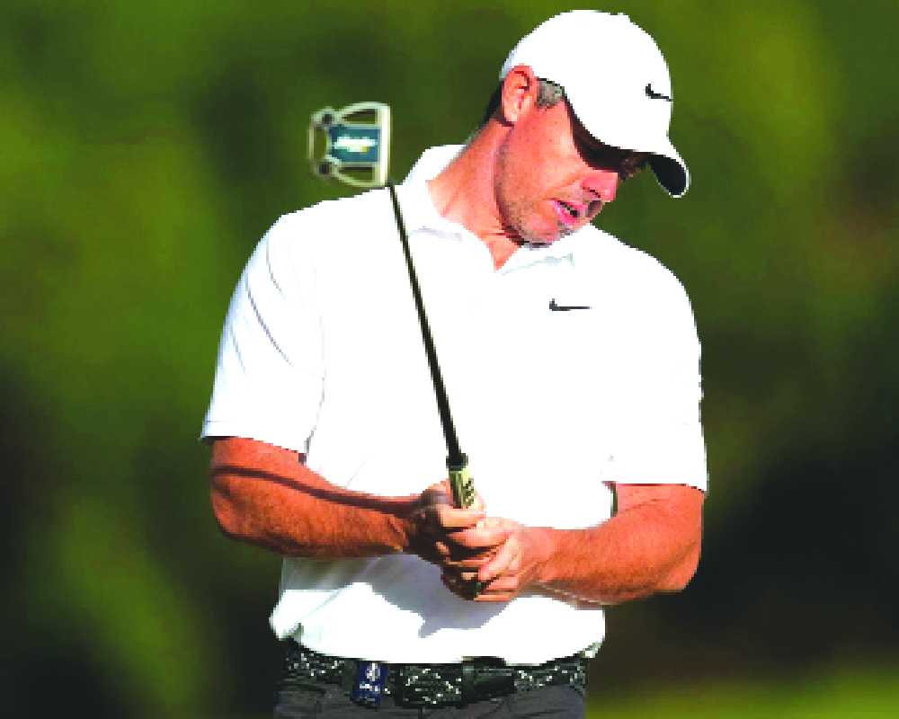 McIlroy’s late birdie burst keeps him alive at Australian Open