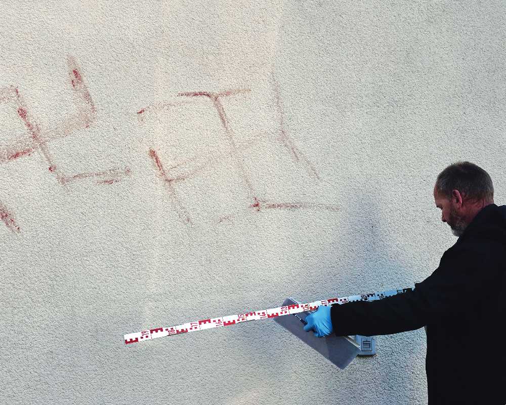 Police investigate swastikas painted with blood in Germany